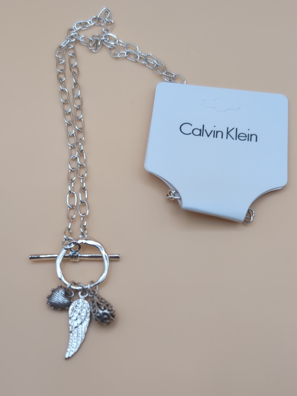 Calvin Klein Silver Toggle Necklace with Wing, Heart & Textured Charms NEW!